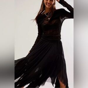 Free People Fp One Clover Skirt
Asymmetrical Tiered Mid-rise Black